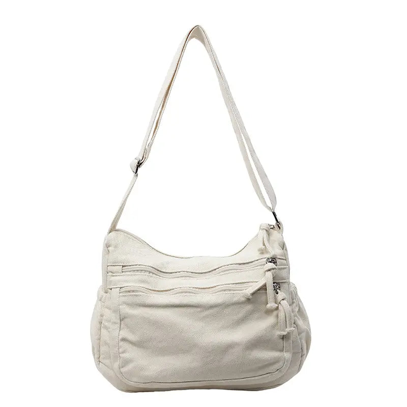 👜✨Bolso bandolera de lona desgastada de gran capacidad: diseño con múltiples compartimentos con cremallera y correa ancha ajustable para el hombro.