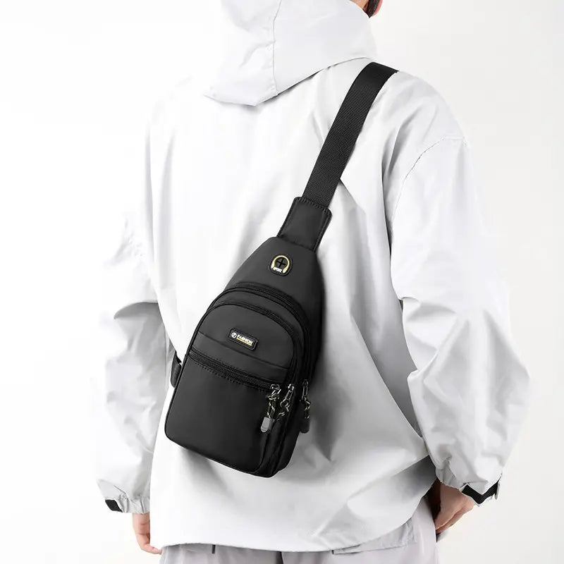 【Compra 1 y llévate 1 gratis】2 piezas 32 euro🔥Bolso bandolera informal para hombre, bolso de pecho ligero para viajes y deportes.