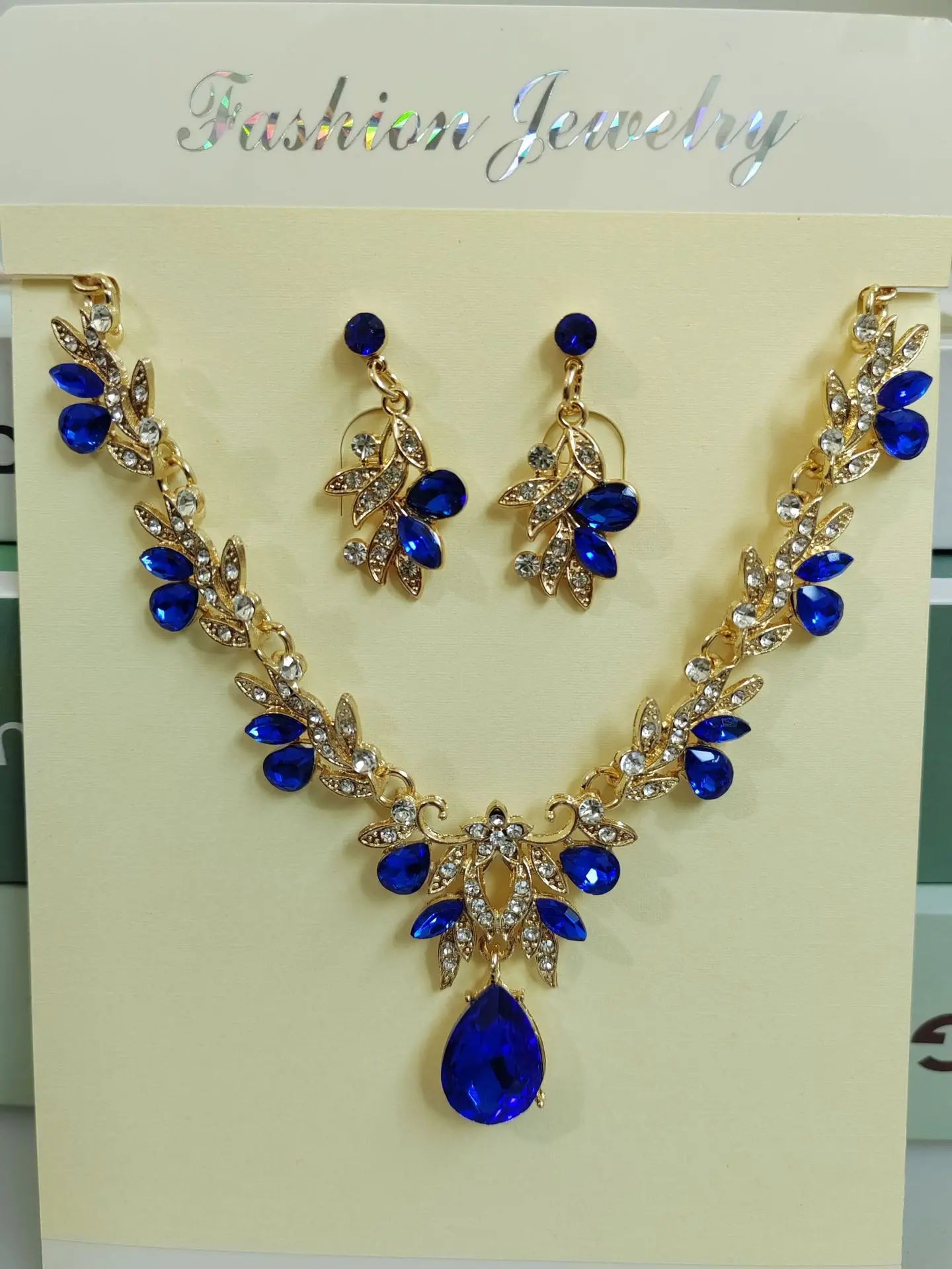✨✨Conjunto de collar y pendientes con colgante en forma de gota brillante