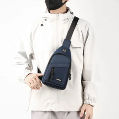 【Compra 1 y llévate 1 gratis】2 piezas 32 euro🔥Bolso bandolera informal para hombre, bolso de pecho ligero para viajes y deportes.