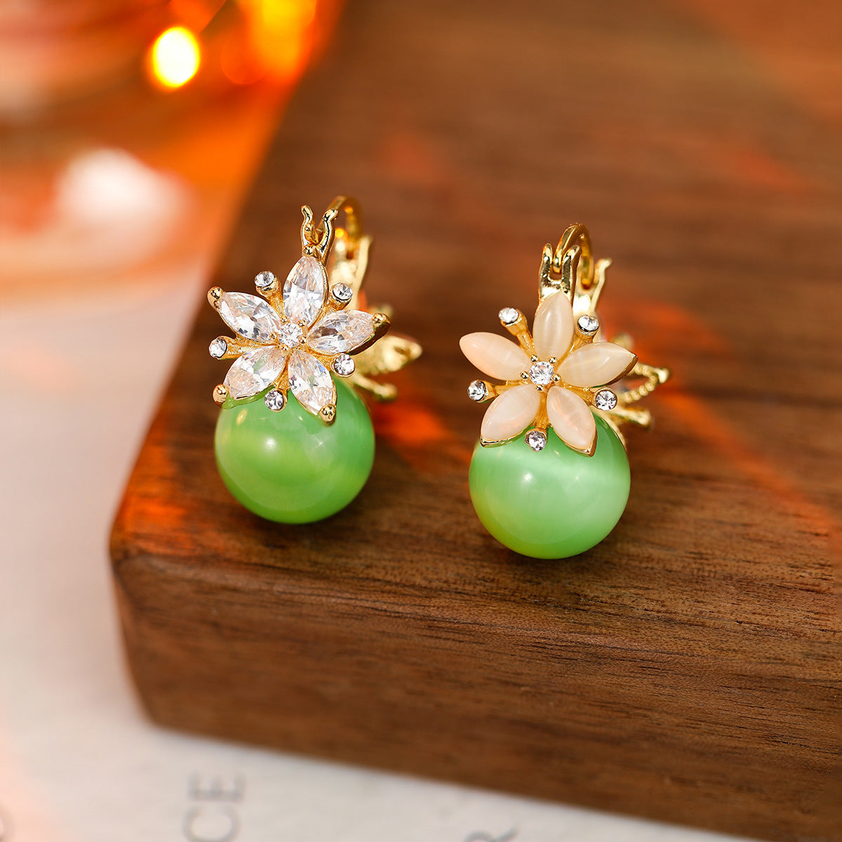 ✨Pendientes de ojo de gato con flor de doble cara y circonita