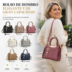 Bolso bandolera para mujer con costuras en forma de V, herrajes dorados, múltiples compartimentos y asa superior.