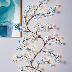 🌸✨ Las luces LED con forma de flor de durazno se utilizan para decorar paredes interiores y crear un ambiente romántico.