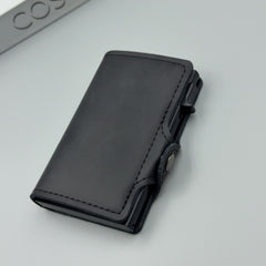 👜🔥【Compra uno y llévate otro gratis】Cartera antirrobo retro de cuero genuino para hombre