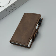 👜🔥【Compra uno y llévate otro gratis】Cartera antirrobo retro de cuero genuino para hombre
