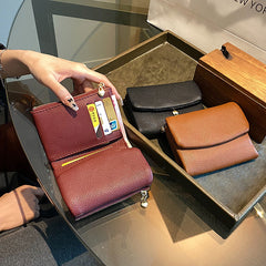 🔥✨【Compra 1 y llévate 1 gratis】⏰Cartera unisex Pebble de piel auténtica con protección RFID🔥