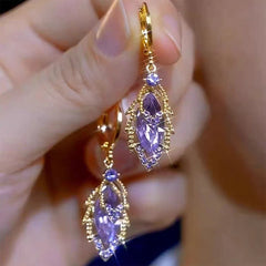 ✨Elegantes pendientes de oro con diamantes brillantes