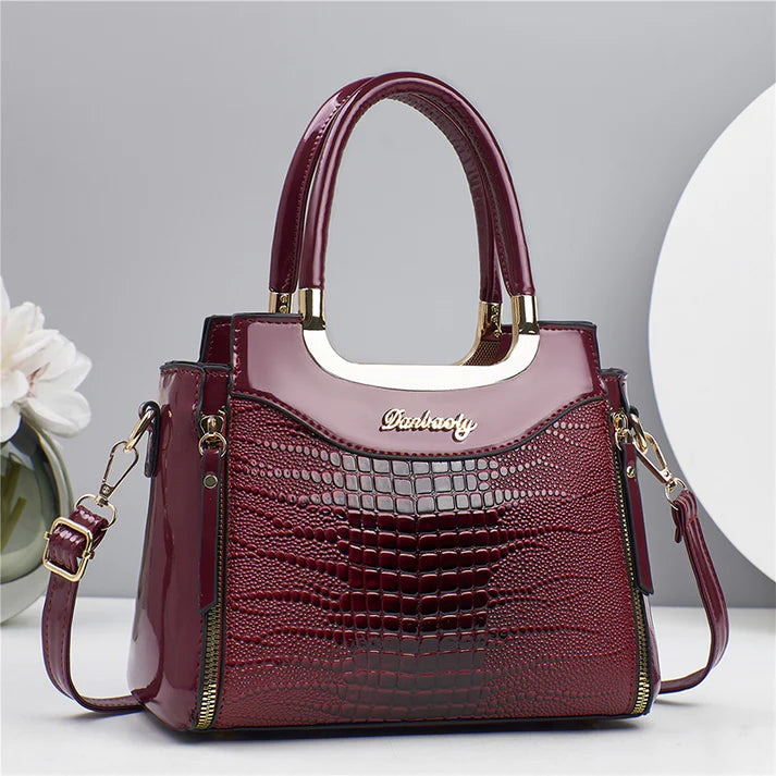 💎Oferta imperdible 2026✨ Bolso de mano vintage brillante con relieve de cocodrilo para mujer: elegante, espacioso y con un estilo impecable.