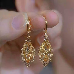 ✨Elegantes pendientes de oro con diamantes brillantes