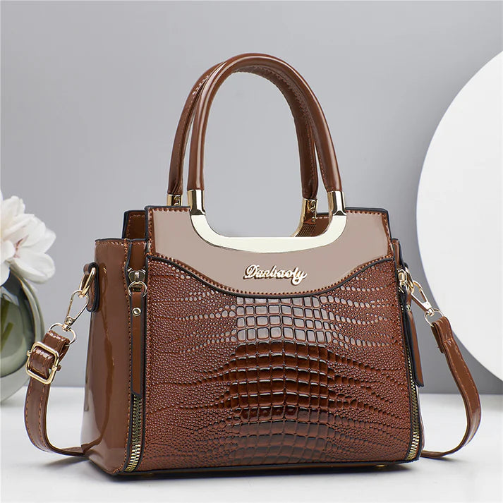 💎Oferta imperdible 2026✨ Bolso de mano vintage brillante con relieve de cocodrilo para mujer: elegante, espacioso y con un estilo impecable.