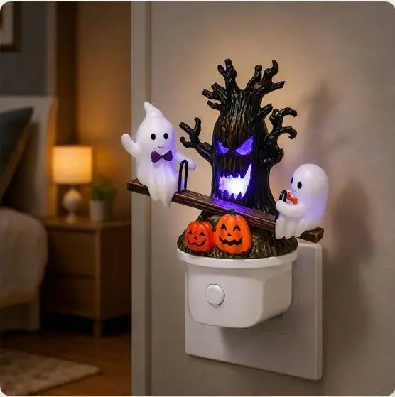 Luz nocturna animada de Halloween con forma de fantasma en un balancín.