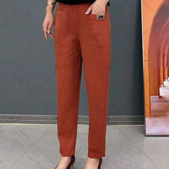 🔥【M-6XL】Pantalones casuales versátiles microelásticos de talla grande para mujer