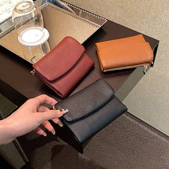 🔥✨【Compra 1 y llévate 1 gratis】⏰Cartera unisex Pebble de piel auténtica con protección RFID🔥