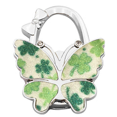 🦋👜【Compra uno y llévate otro gratis】Gancho plegable para bolso con forma de mariposa colorida