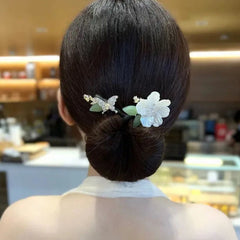 🔥【Compra uno y llévate otro gratis】🌸 Herramienta para moño con diseño de flores y mariposas – Varios estilos disponibles