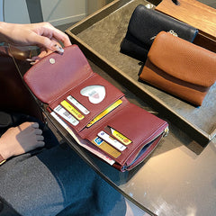 🔥✨【Compra 1 y llévate 1 gratis】⏰Cartera unisex Pebble de piel auténtica con protección RFID🔥