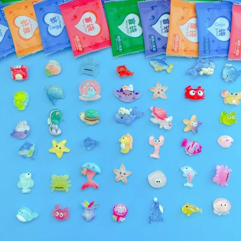 【30 piezas】🎁✨ Bolsas Sorpresa de Animales Marinos Fosforescentes de Resina – ¡Abre y descubre una sorpresa increíble!
